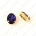 oval purple color fancy stone with claw 